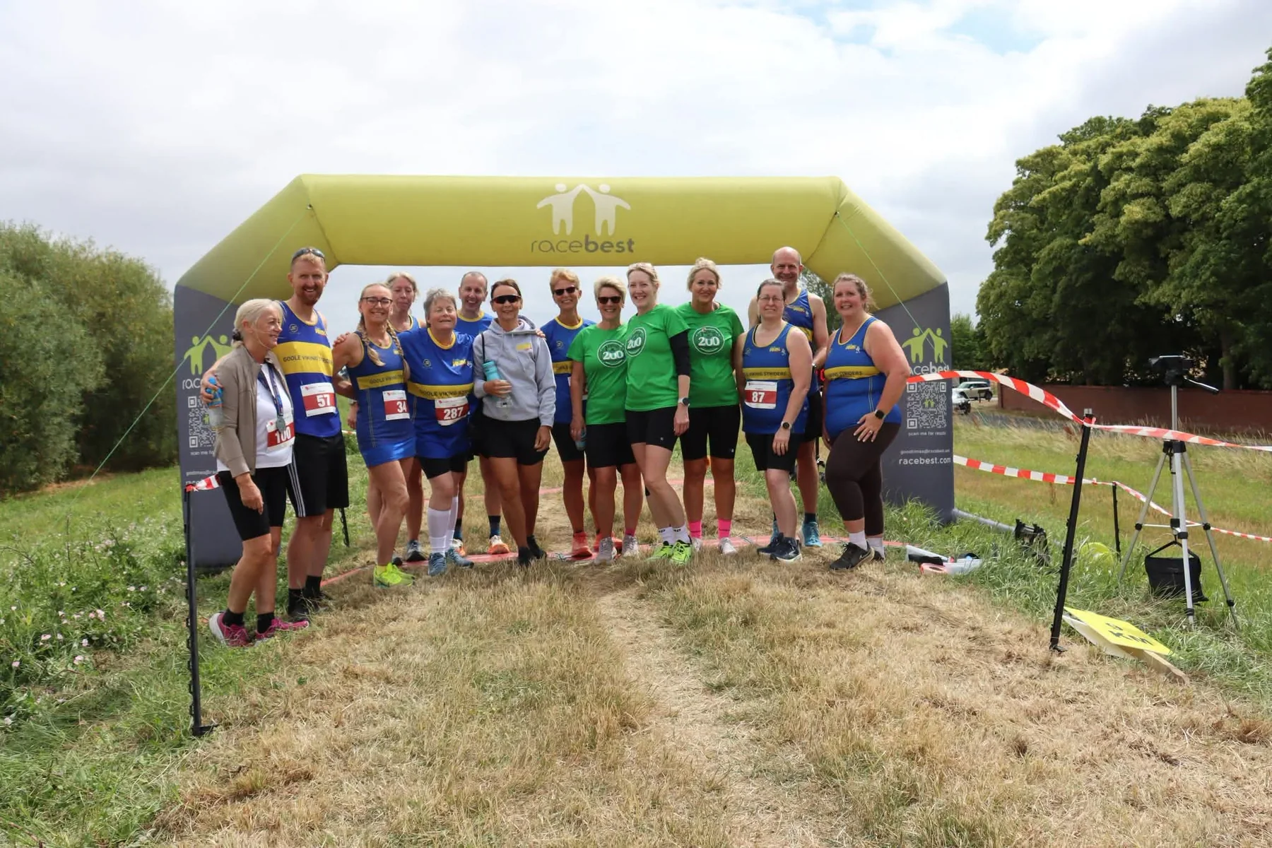 Runners and supporters gathered under the start arch after the 2026 race